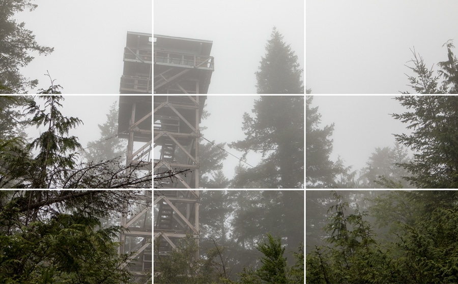 A grid is placed over an image of a fire lookout tower to demonstrate the rule of thirds