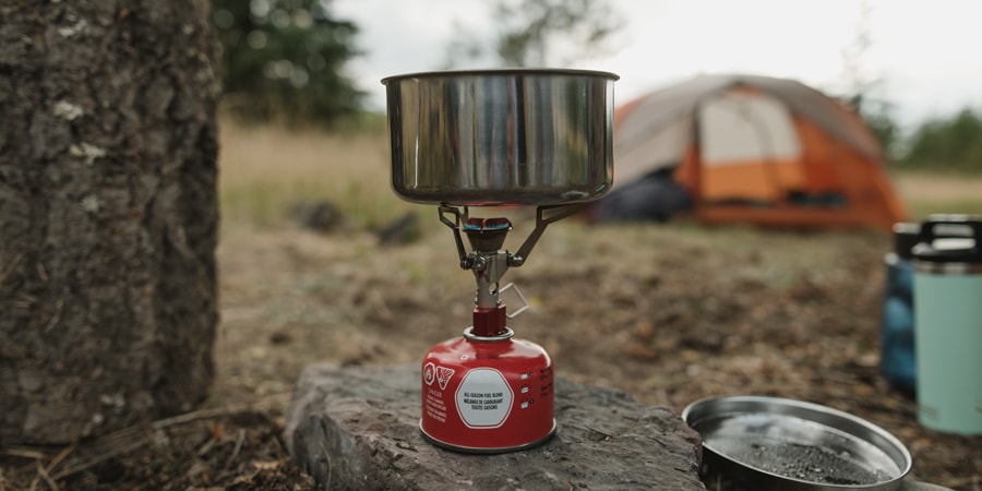 a camp stove placed on level ground