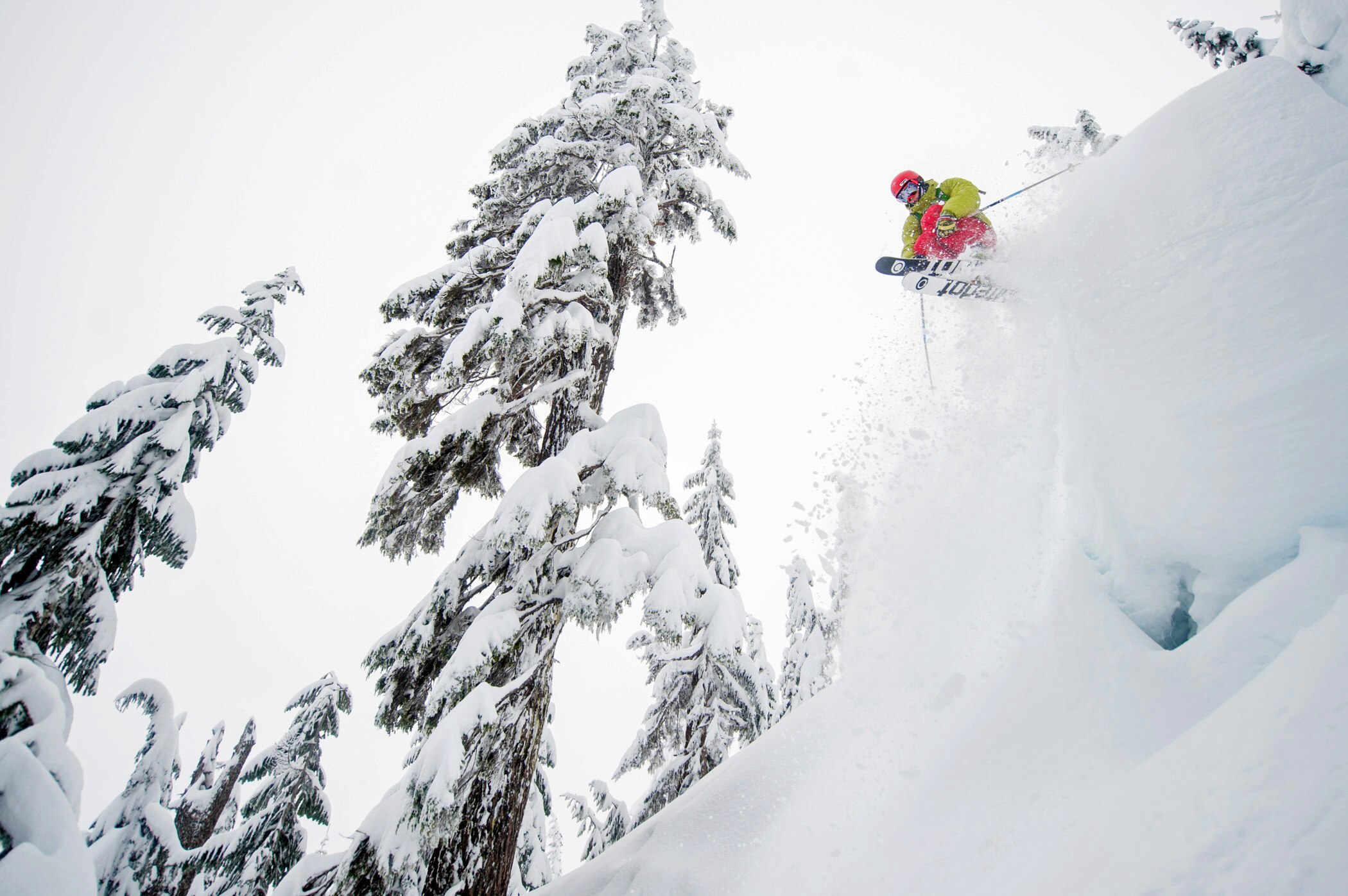 A skier hucks a cliff