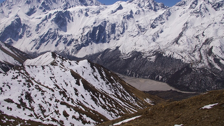 Photo of snowy mountain landscape.