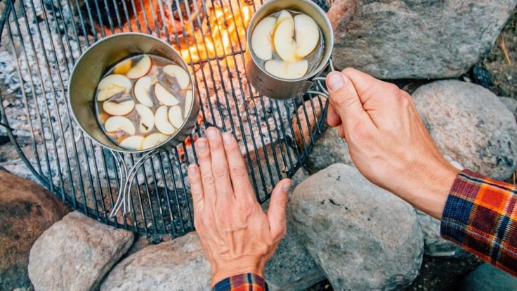 Hot Apple Ginger Cider being prepared on the campfire.