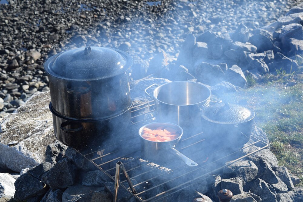 Thanksgiving meal cooking over a fire