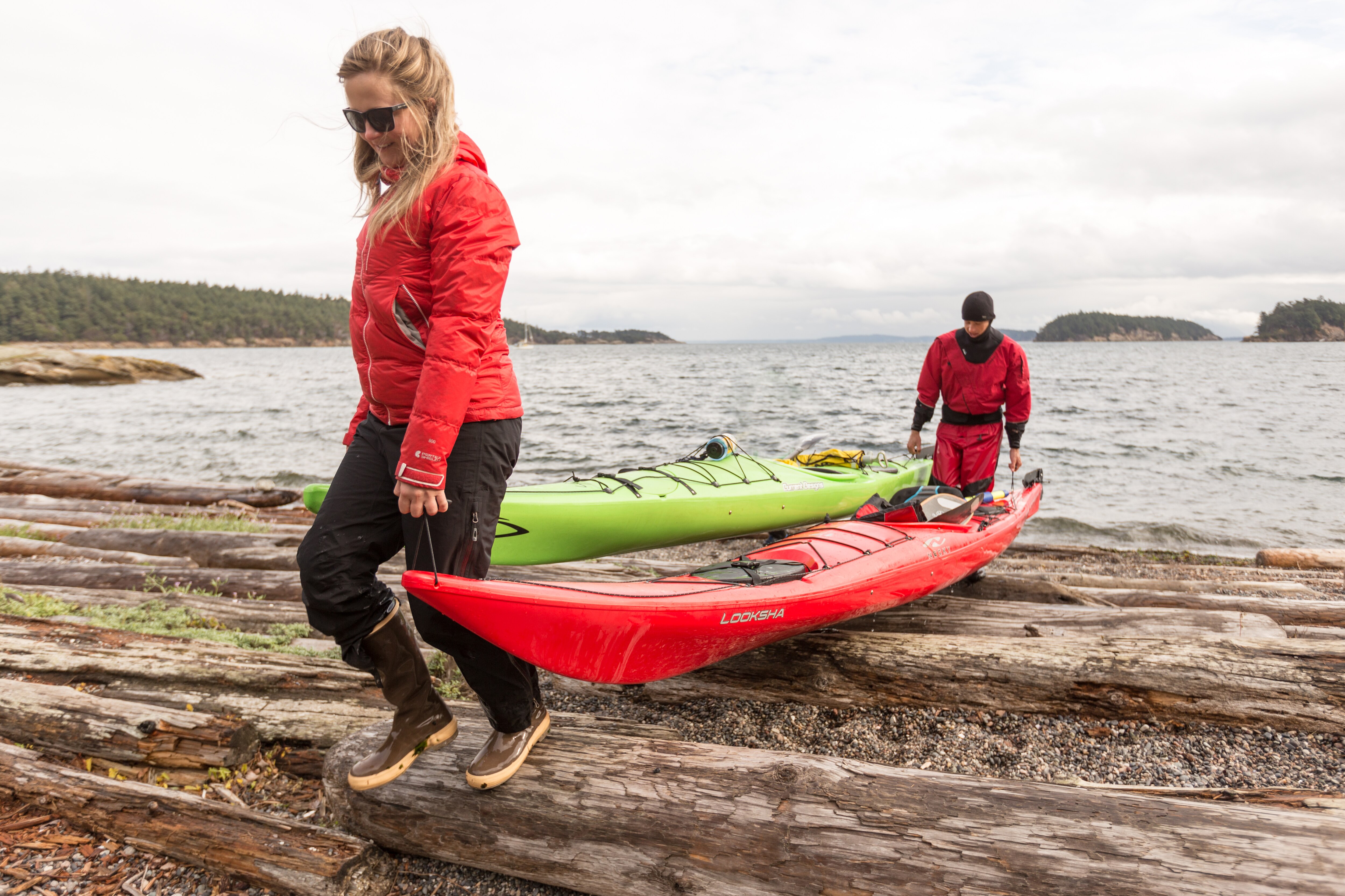 Kayakers pull in their boats