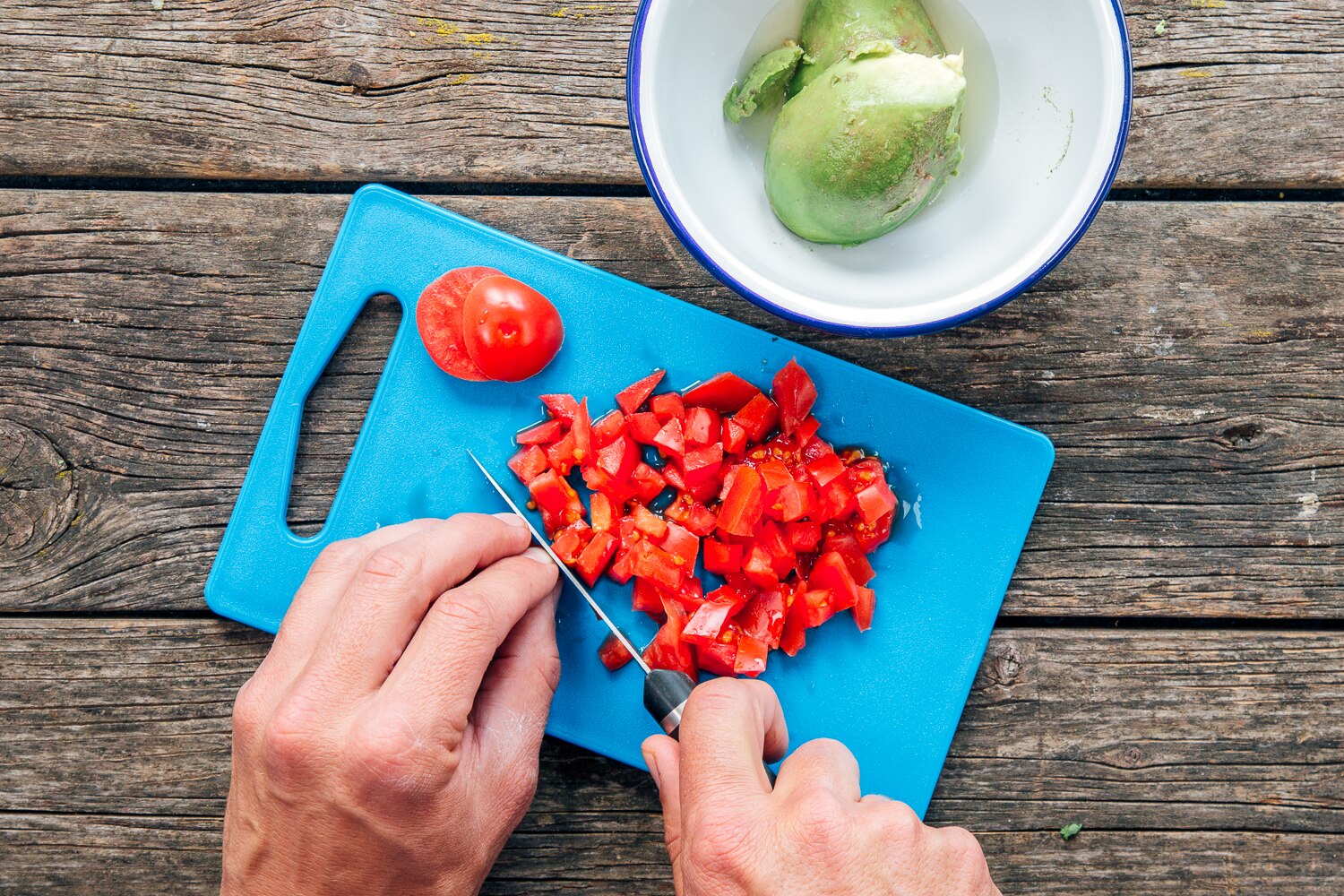 Chopping tomato for guacamole