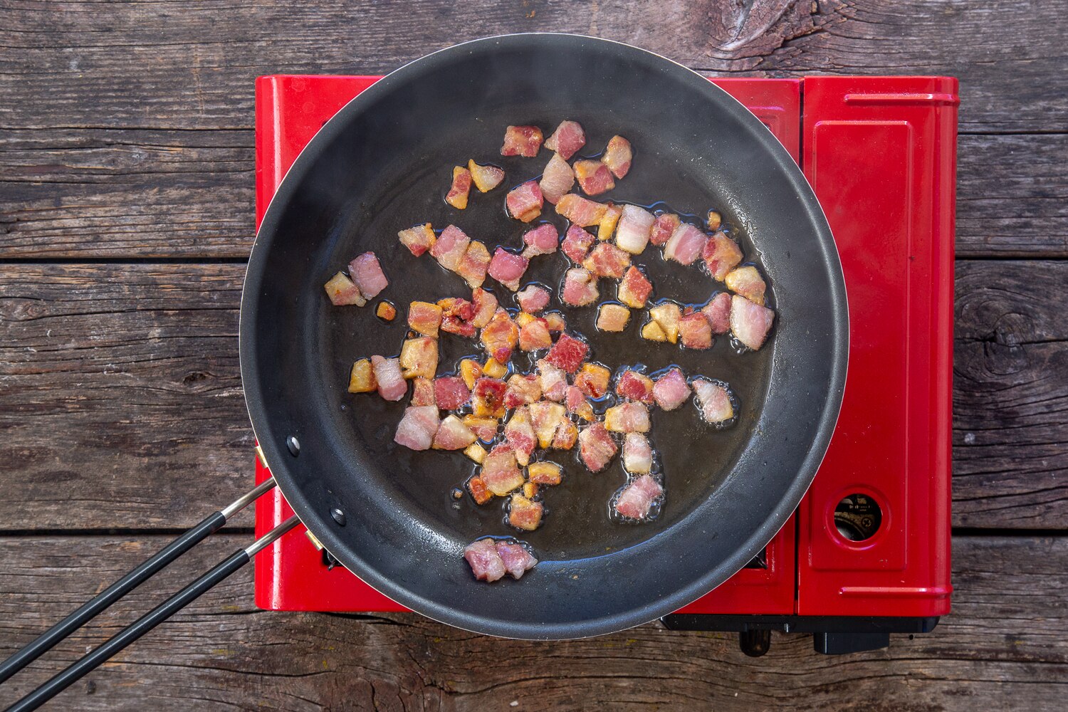 Pancetta in pan sauteeing