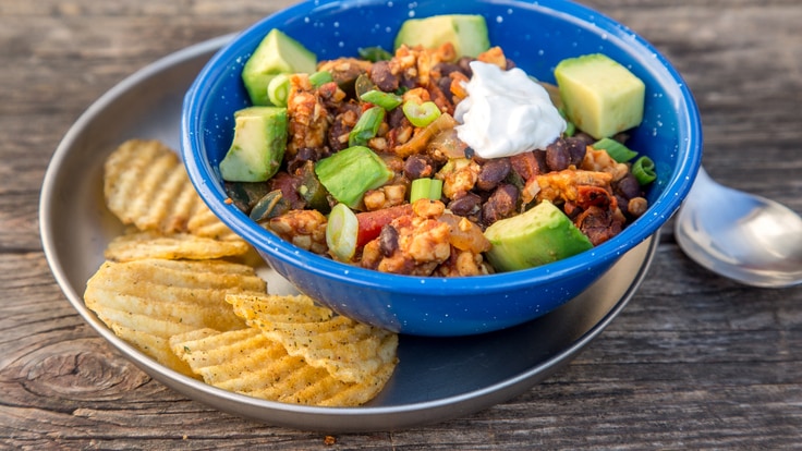 Chipotle tempeh chili plated and ready to serve