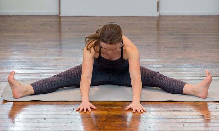 wide angle seated forward fold yoga pose