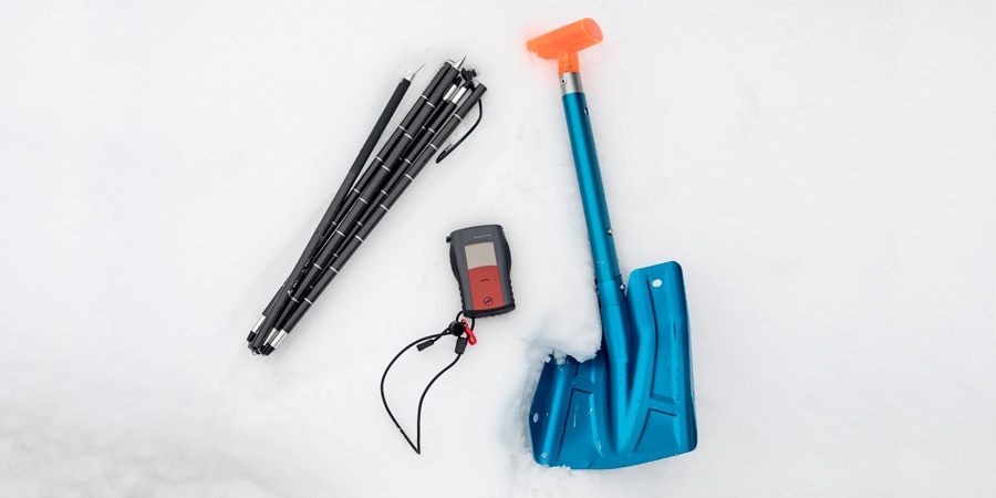 An avalanche probe, transceiver and shovel