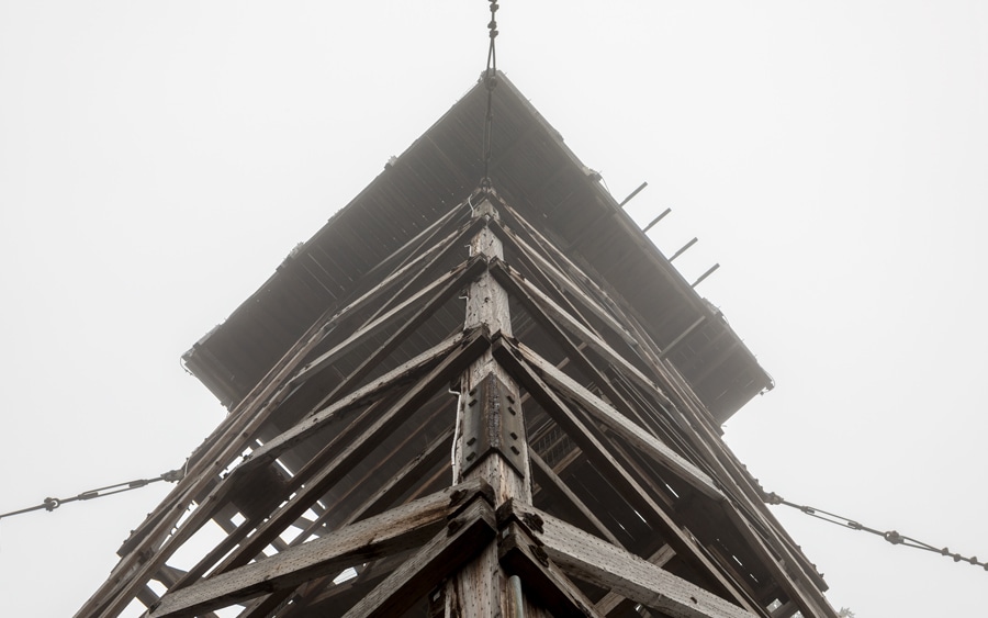 Looking up at a fire lookout tower from an interesting perspective