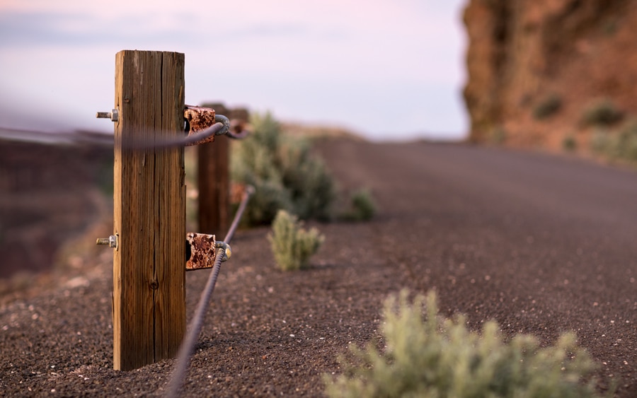 An image of a fence post demonstrating shallow depth of field