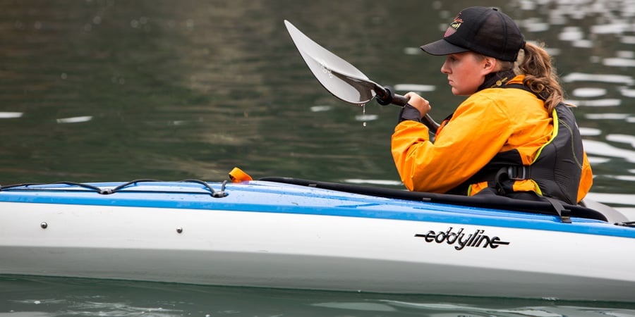 kayaker doing a brace stroke to try and prevent capsizing