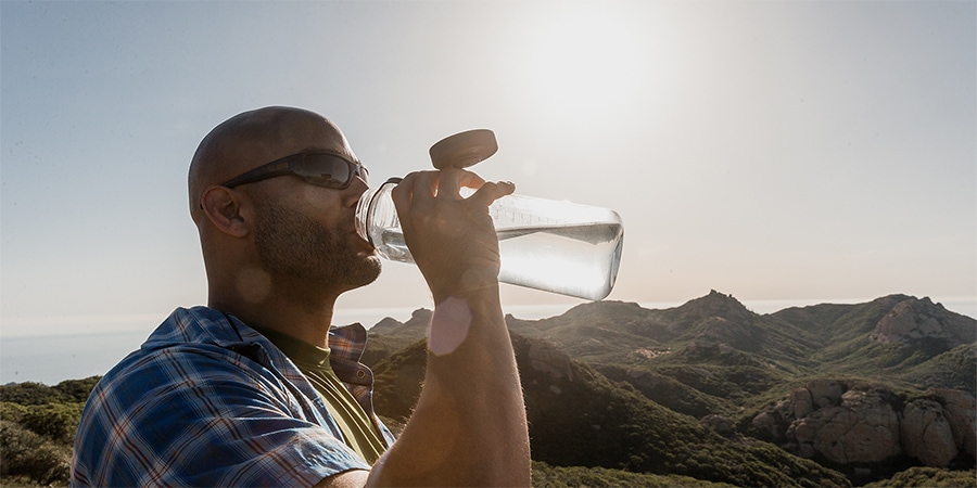 Man drinking water.