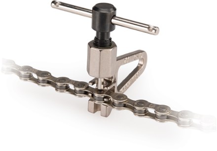 using a bike chain tool