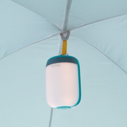 REI Co-op Westward Shelter Light (not included) hung on gear loop