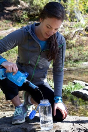 Sawyer Mini Water Filter In use (Blue)