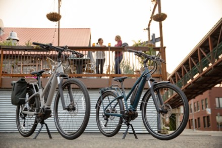 Class 1 electric bikes standing in front of cafe