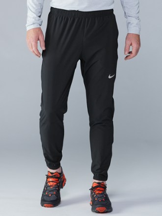 nike essential woven running pants