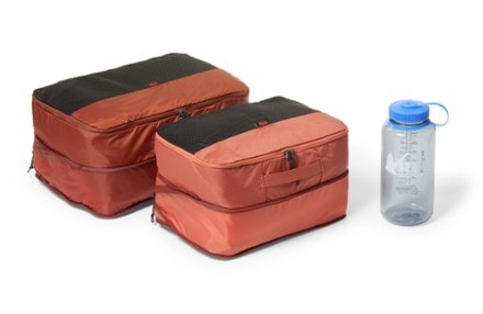 REI Co-op Expandable Packing Cube Set - Medium/Large Shown in expanded form; 32 fl. oz. bottle (not included) shown for size reference only