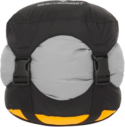 Dry bag outlet compression sack